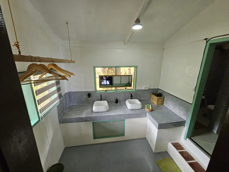 Double sink vanity in the shared Palmscape bathroom at DK2 Resort, Palawan